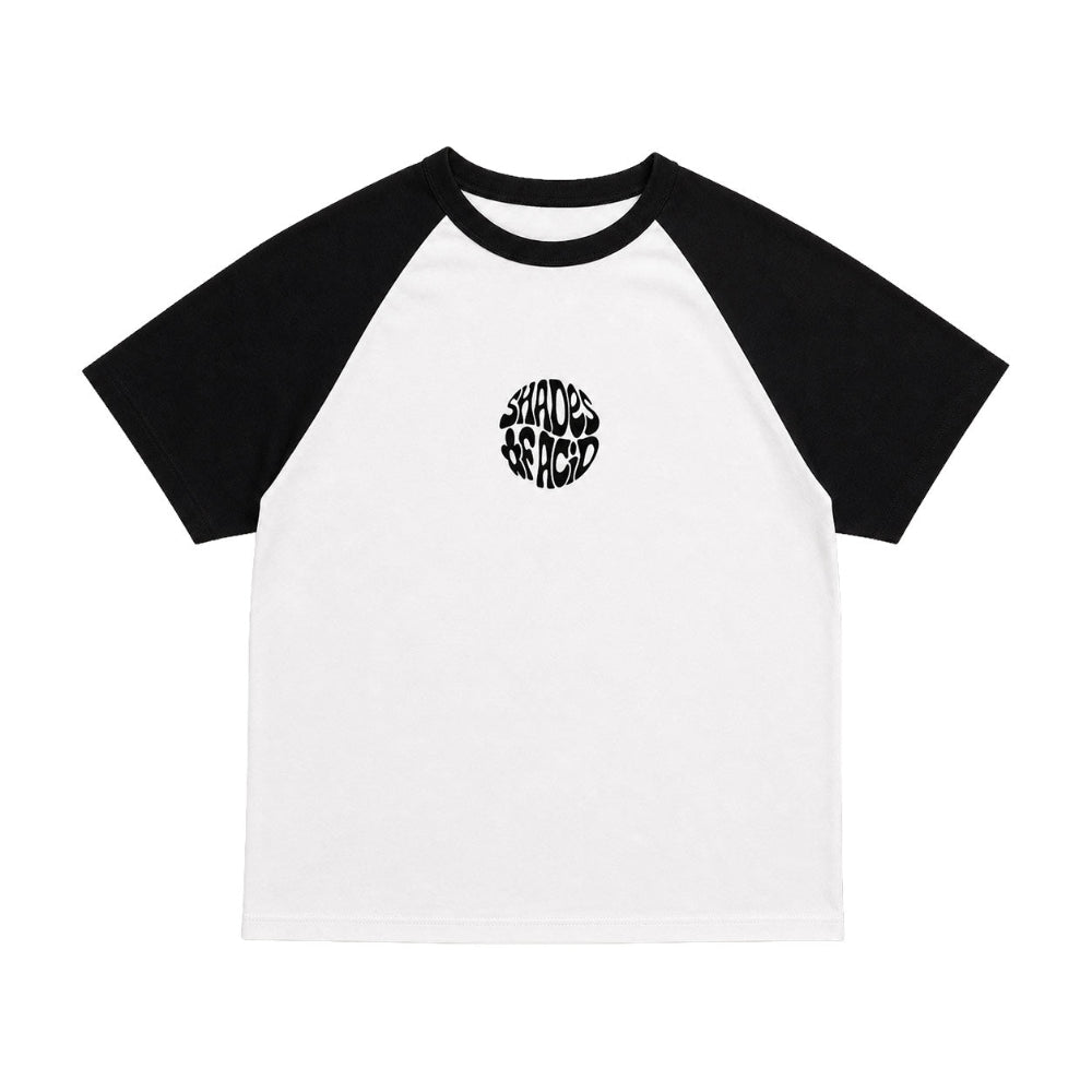 A white and black raglan baseball t-shirt with a circular black graphic on the chest reading 'SHADOWS ARE LIGHT'.