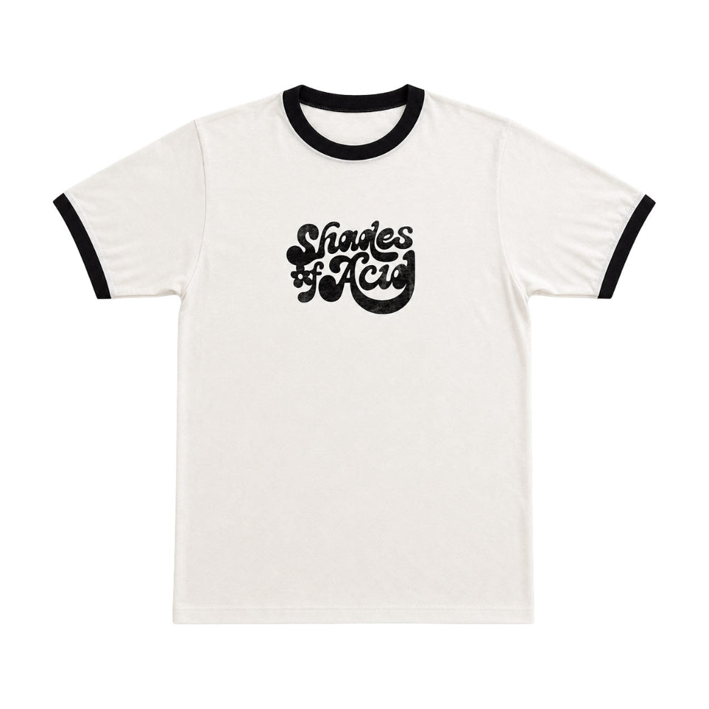 An off-white ringer t-shirt with black trim on the collar and sleeve cuffs, featuring a black graphic text print that reads 'Shades of Acid' on the chest.