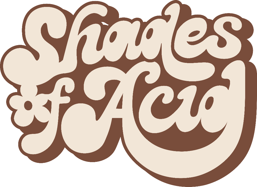 A retro-style graphic reading 'Shades of Acid' in cream-colored bubble lettering with a thick brown outline, set against a solid black background.